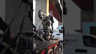 Girl learning to wheelie on the wheelie machine cbr600 stunt bike