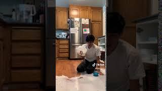 cup shoes spilling milk TikTok @kisonkee  [Tik Tok Archives]