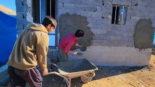 "Cementing the wall of the hut with Abu and cooking a delicious lunch with Ali"