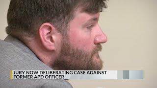 Former APD officer accused of dragging disabled man out of Target takes the stand