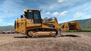 Contractor Combines Cat 963 Track Loader with 6-Way Dozer Blade