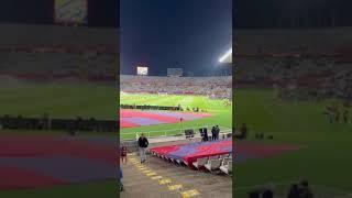 FC BARCELONA SPAIN Watching football in rainy night