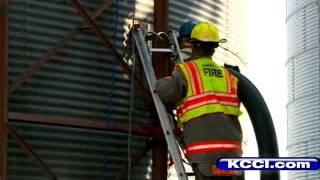 Rescuers Work To Save Man Stuck In Grain Bin