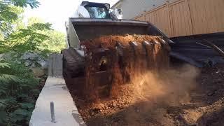 Bobcat grading and clean up new construction in Atlanta, GA