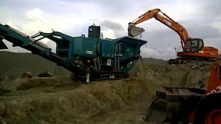 Powerscreen XA400S Jaw & 1000SR cone crusher in a Granite Application in Sri Lanka