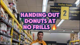 Handing out donuts at No Frills 