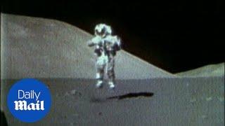 Astronaut Eugene Cernan runs and jumps on the Moon - Daily Mail