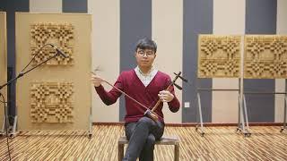 Blind student play Chinese Jinghu music - 夜深沉 Yeshenchen