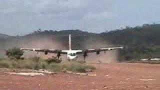 Dash 7 taking off - gravel field