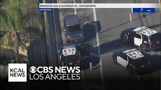 Pursuit suspect drives away from LAPD officers after PIT manuever