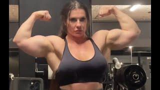 46 years young muscle woman Natasha Broegger flexing her big biceps