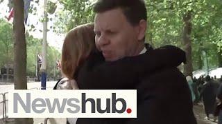 Overwhelmed with emotion: Hayes, Gower share hug after procession of Queen's coffin | Newshub