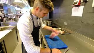 Chef Tim Boury prepares a seabass dish at 2 star (now 3*) restaurant Boury, Roeselare, Belgium