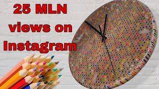 Wall clock made of colored pencils and epoxy