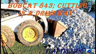 BOBCAT 843 - CUTTING IN A DRIVEWAY / REMOVING SOD / SPREADING BASE LAYER OF GRAVEL