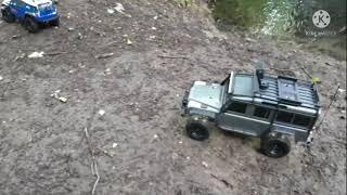 traxxas trx4 defender VS  ftx outback geo stream crawling   /  with a little rescue mission