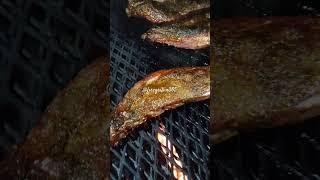 Searing the pear smoked rib tips on the offset 300 gallon smoker #bbqlovers