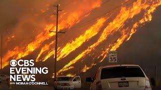 New wildfire explodes in size north of Los Angeles