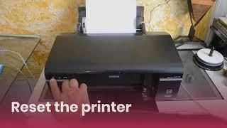 How to fix the printer communication error on an Epson device?