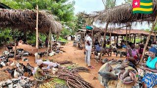 Rural village market day in Aveta Togo west Africa .  Cheapest village market in Togo