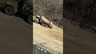 Remembering sunnier days #dirtwork #construction #mountainmovers #rocktruck #dozer #buildwithberg