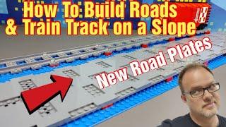 How to make a sloped road with the new lego road plates and lego train track.