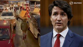 Trudeau slams rival lawmakers as truckers dig in with protest on Ambassador Bridge