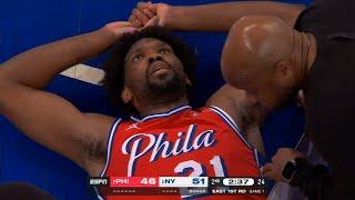 Joel Embiid insane self oop off glass for poster dunk but hurts his knee again 