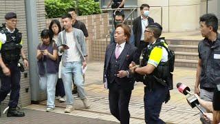 Hong Kong: Two ex-district councillors acquitted in landmark subversion case | AFP