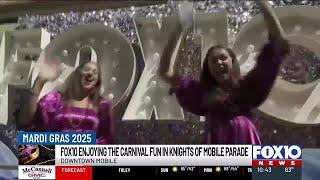 FOX10 float and crew in the Knights of Mobile parade