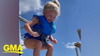 Little girl gives herself pep talk to jump into water