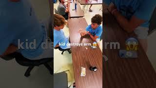 kid destroys in arm wrestling 