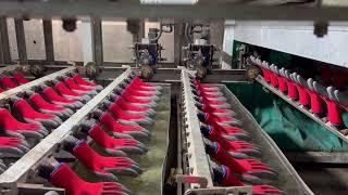 Production video of crinkle latex coated gloves