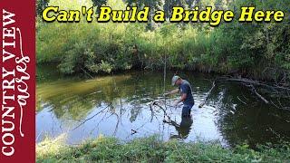 Building a bridge across the pond inlet isn't going to work.