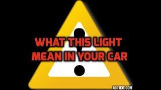 What does the yellow triangle light on my car mean?