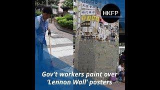 Gov't workers paint over Hong Kong protest posters