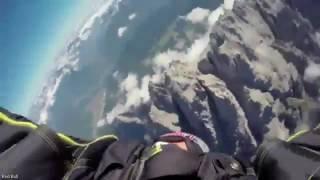 two wingsuit flyers soar 13000ft above the mountains