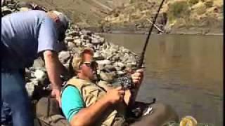 Gigantic Sturgeon in an Inner tube - Babe Winkelman's Good Fishing