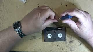 Repairing and recovering a damaged 8mm video cassette