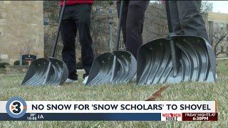 UW student-run shoveling business 'Snow Scholars' gearing up for later winter after slow start