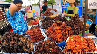 Cambodian street food in Phnom Penh - delicious plenty of exotic foods, pork ribs chicken & more
