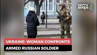 Ukraine: Woman Confronts Armed Russian Soldier