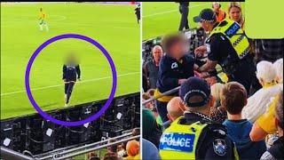 Intense Moment Pitch Invader is Stopped by a Soccer Fan