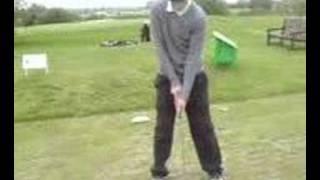 dom playing golf