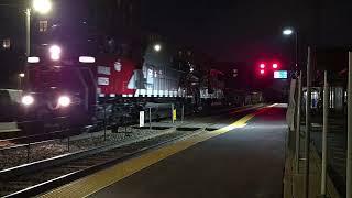 Freshly repainted WAMX 6025/6026 lead WSOR T001 at Morton Grove