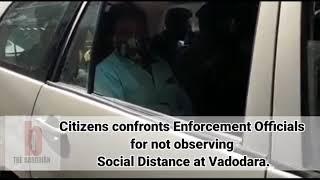 Barodian confronted the enforcement officials for not maintaing Social Distance.