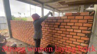 Strong women laying brick so amazing at site construction