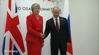 May Meets Putin at G-20 Summit With Grim Stare
