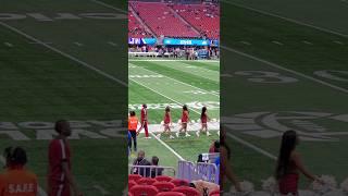 South Carolina State cheerleaders walk into the stadium pre-game at the Celebration Bowl