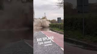 Huge tractor splash in flood